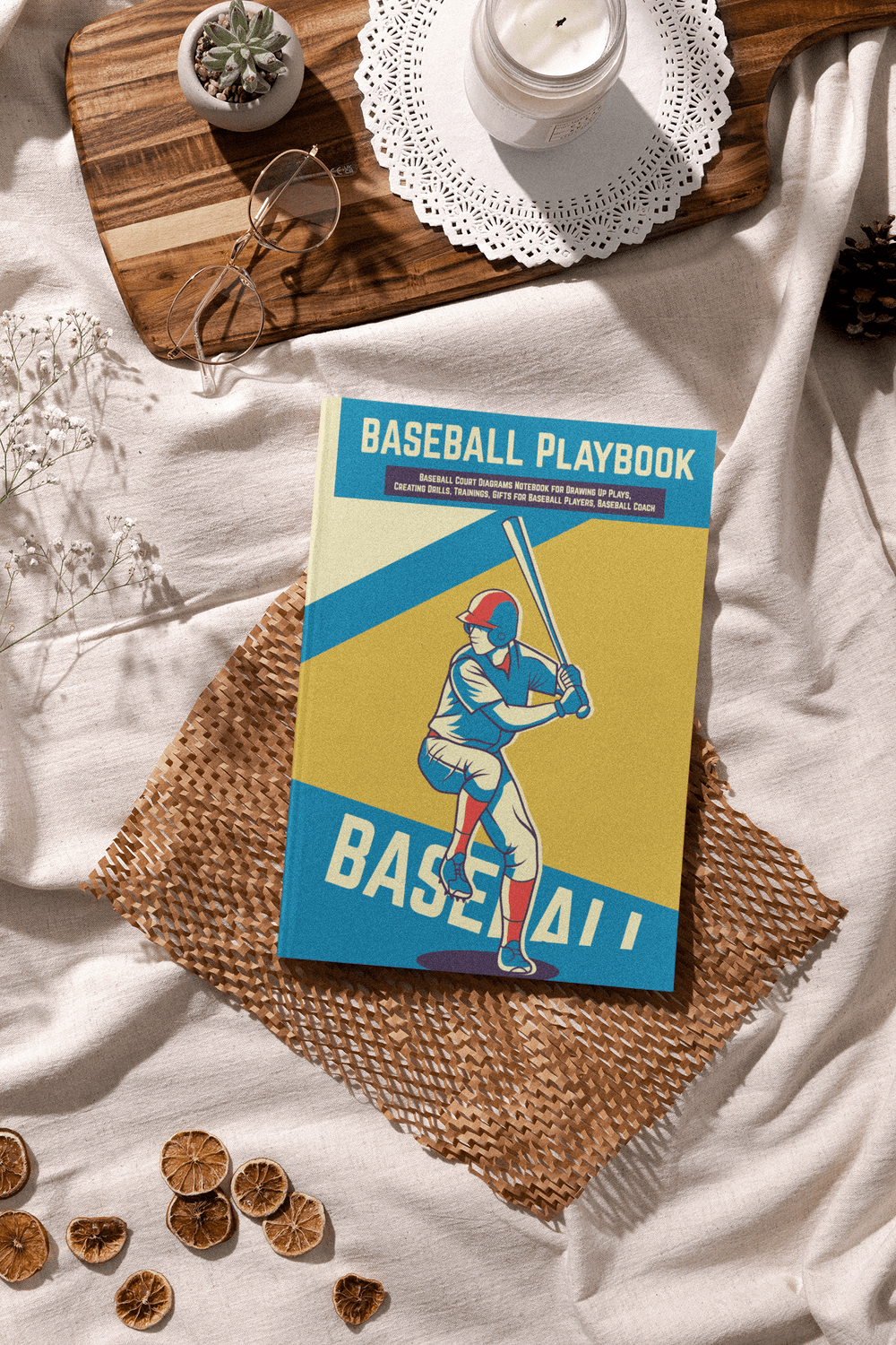 Colorful baseball playbook on a woven mat, ideal for coaches to plan strategies and drills.