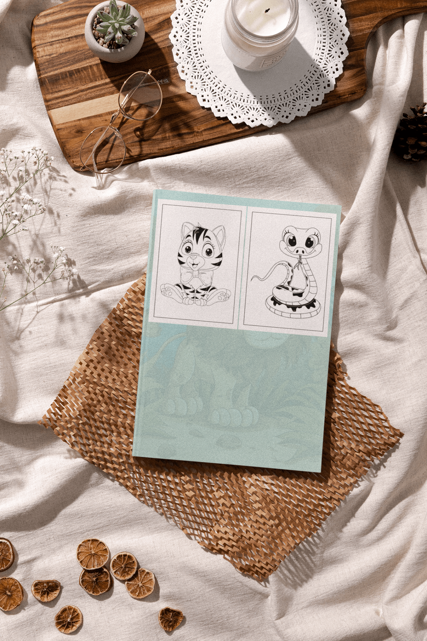 Cute Animals Coloring Book for Kids featuring illustrations of a tiger and a snake on a cozy table setting.