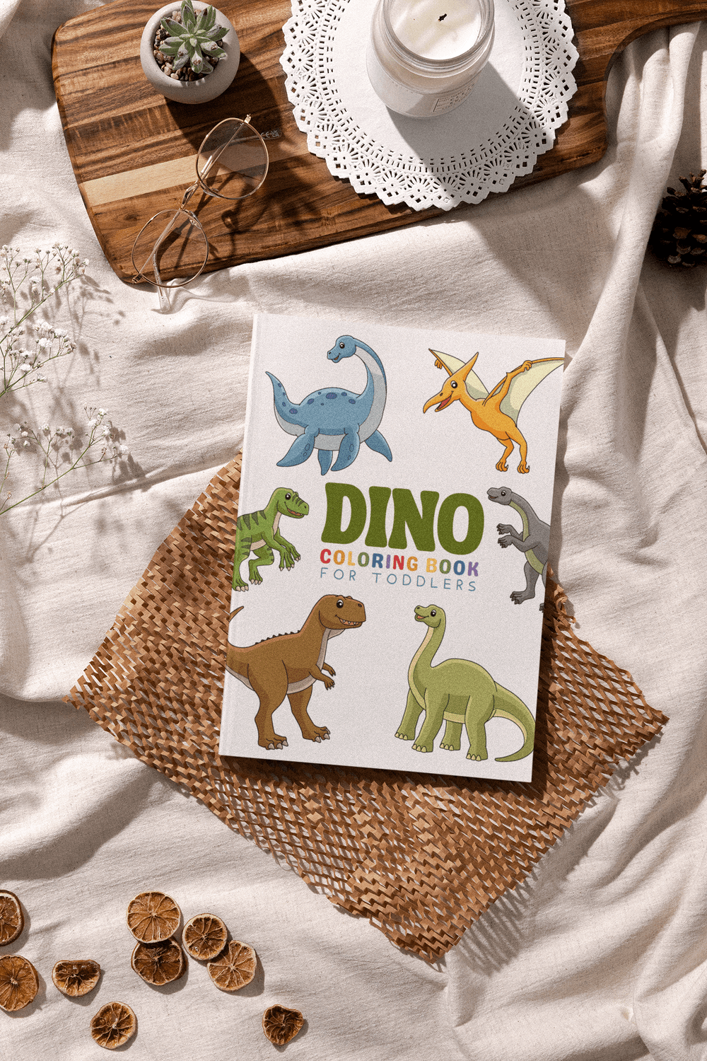 Dino Coloring Book for Toddlers featuring colorful dinosaur illustrations on a cozy background.