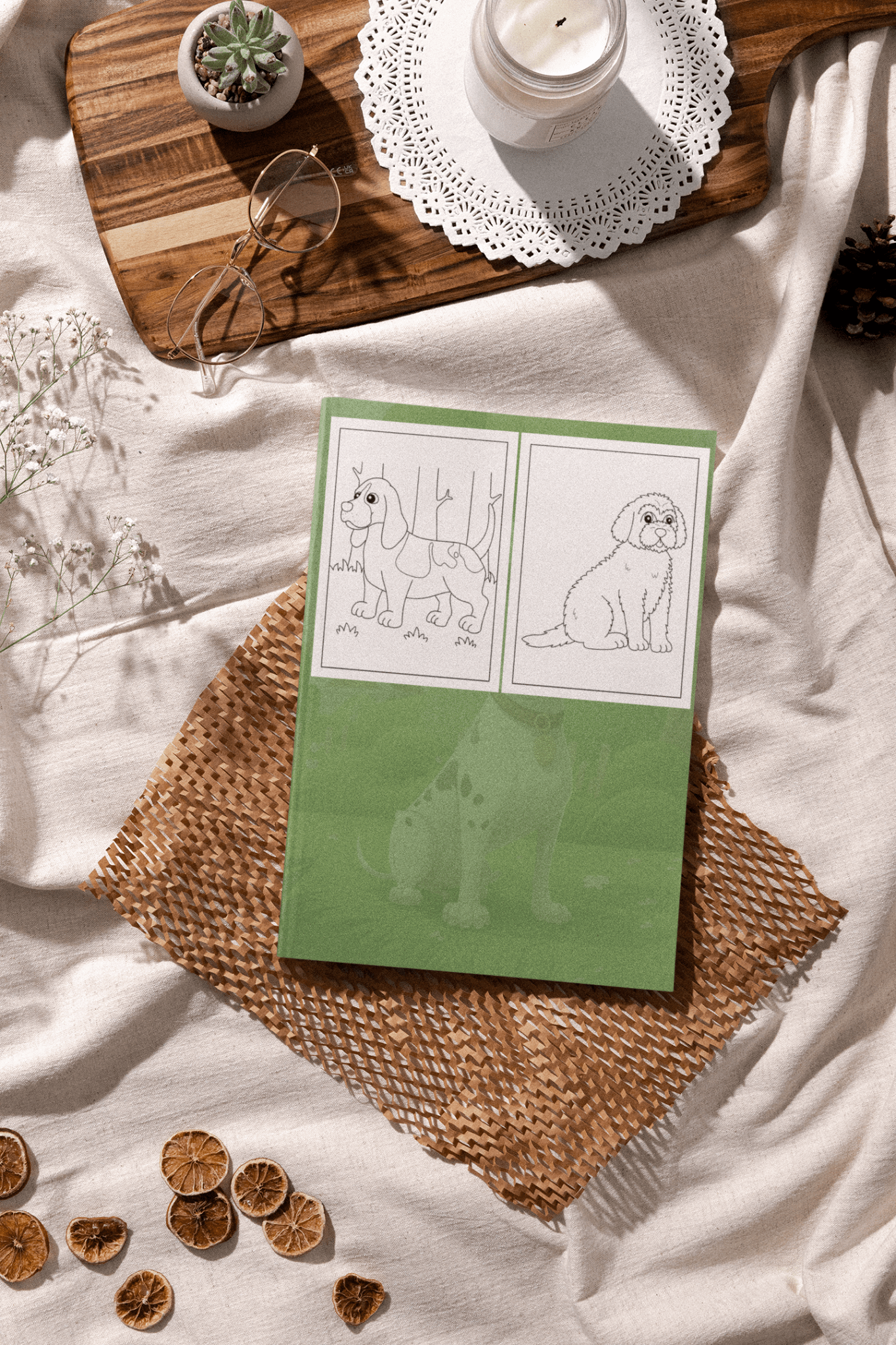 Dogs & Puppies Coloring Book for Kids displayed on a textured surface with natural decor.