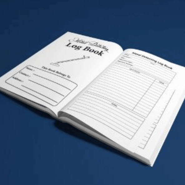 Open metal detecting log book showcasing pages for recording finds and details.
