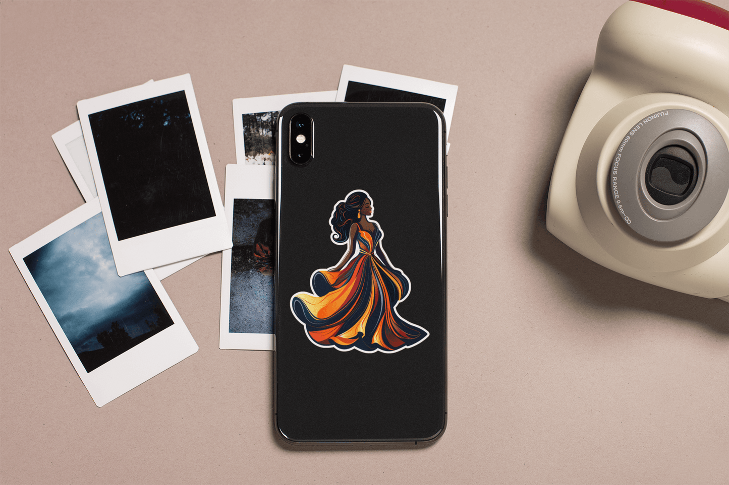 Midnight Elegance Sticker on a phone with polaroid photos, showcasing vibrant colors and artistic design.