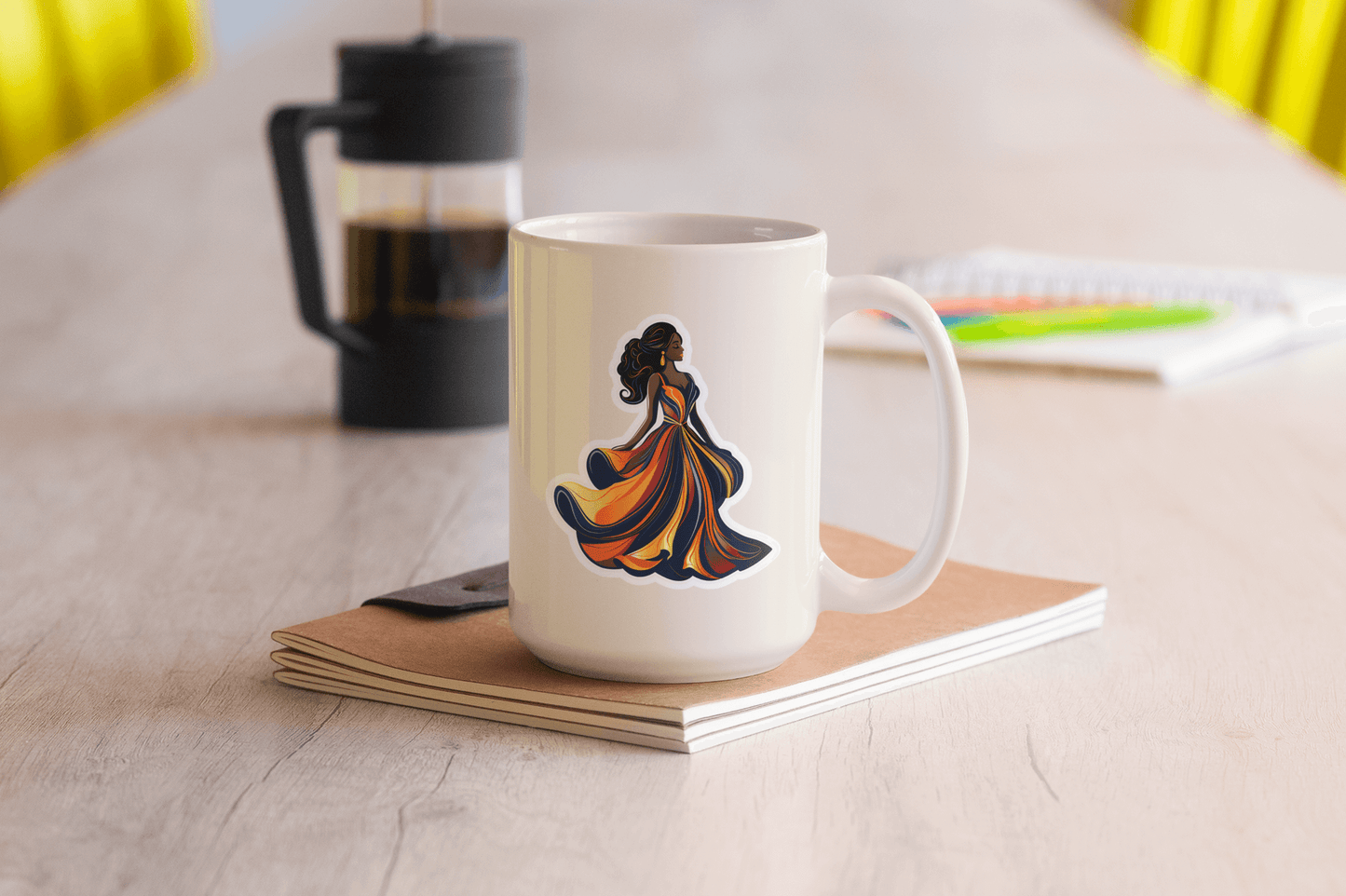 Midnight Elegance Sticker on a white mug, enhancing decor on a wooden table with a notebook and coffee press in background.