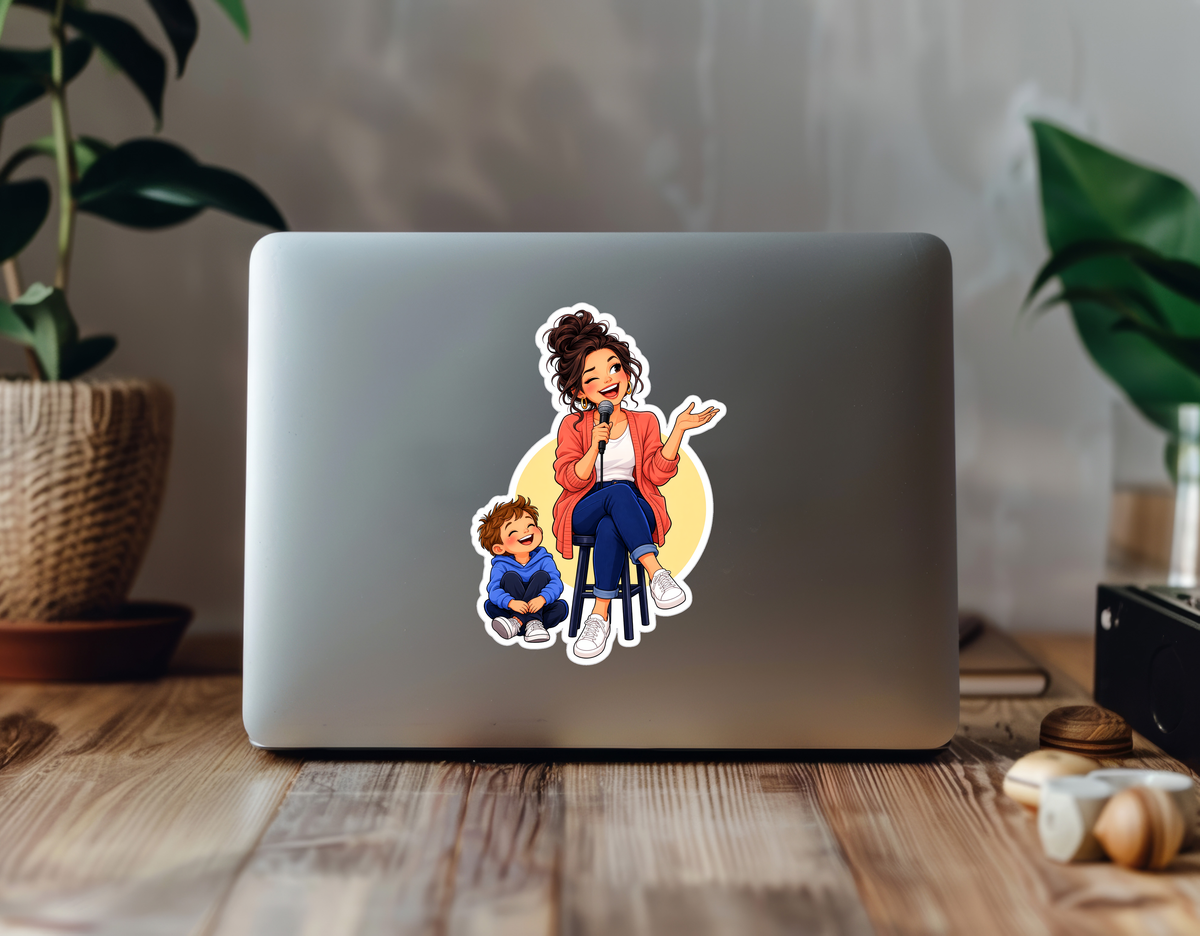 Comedy Mom Jokes Sticker sticker displayed on a laptop in a plant-filled workspace