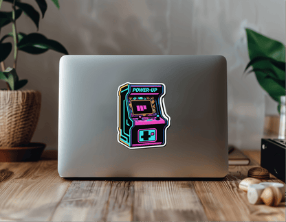 Retro Arcade Power vinyl sticker on a laptop featuring a colorful arcade machine design.