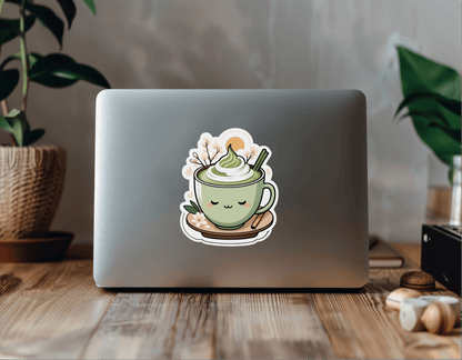 Matcha Morning Aesthetic Vinyl Sticker on a laptop with a cute cup of matcha design.