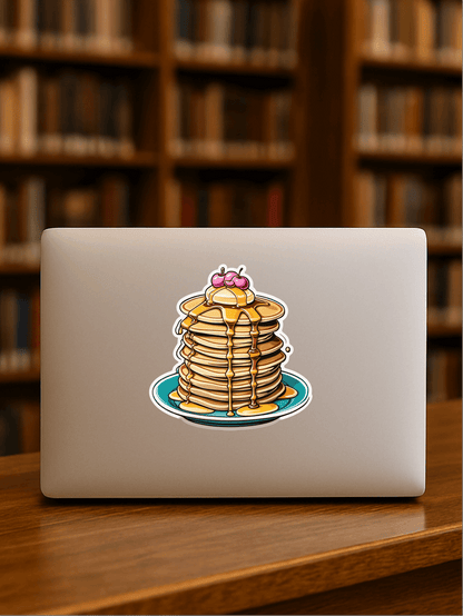 Cherry on the top Pancake Stack Vinyl Sticker on a laptop in a library setting.